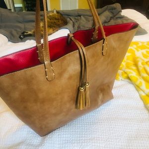 Reversible bag with insert.